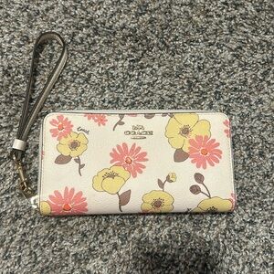 Coach floral cluster zip around wallet.